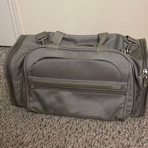 Tumi gray duffel bag
